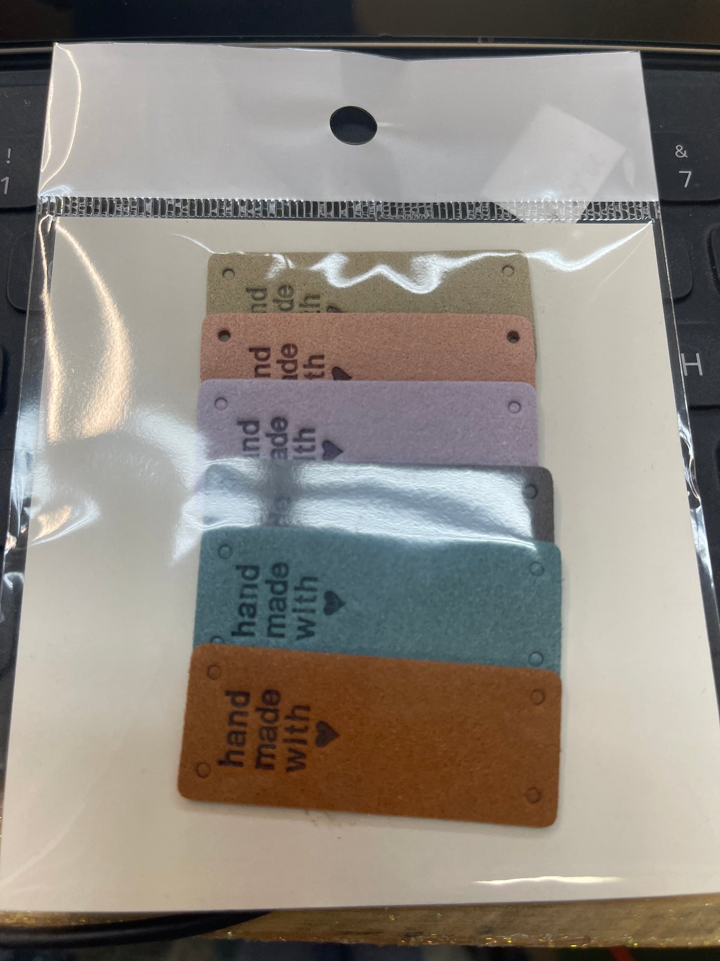 Coley Intl handmade leather heart tags